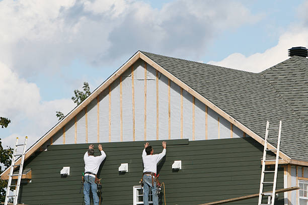 Professional Storm Damage Siding Repair technician working in Ronks, PA